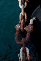 rusty chain on the Sydney Harbour, vertical