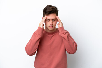 Naklejka premium Young handsome Brazilian man isolated on white background with headache