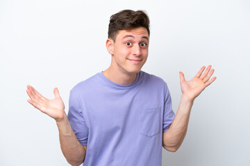 Young handsome Brazilian man isolated on white background making doubts gesture