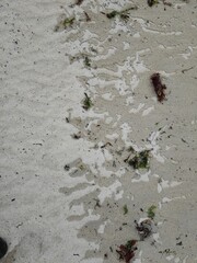 Feuchter und trockener Strandsand