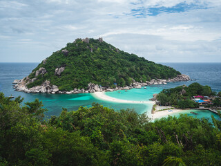 Scenic high angle view of Koh Nang Yuan Island viewpoint. Tropical paradise with iconic white sand bar, clear turquoise sea with coral reef. Near Koh Tao Island, Surat Thani, Thailand. Diving spot.