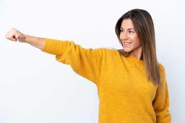 Middle age caucasian woman isolated on white background giving a thumbs up gesture