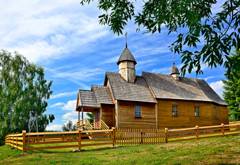 Old wooden  catholic church in Oderne village near Gorlice, Low Beskids (Beskid Niski), Poland - obrazy, fototapety, plakaty