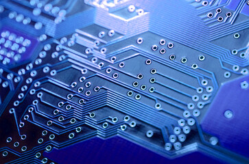 close-up of electronic printed board. Electronic board with blue light effects