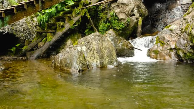 Mervisi waterfall flows into the lake , near Batumi, Georgia, aerial shot. High quality 4k footage