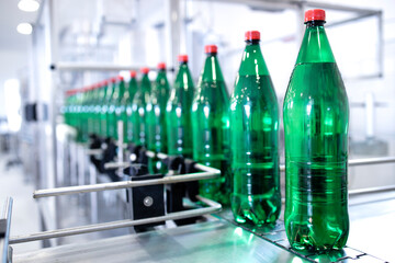 Bottled drinking water being produced in water factory.