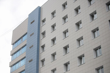 facade of a new multi-storey building with many windows
