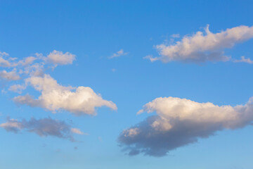Cumulus clouds in sunny day. Atmosphere background or wallpaper