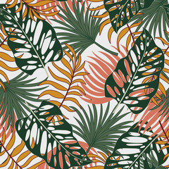 Fototapeta na wymiar Fashionable seamless tropical pattern with bright plants and leaves on a gray background. Exotic jungle wallpaper. Beautiful print with hand drawn exotic plants.
