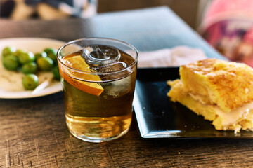 Spanish pincho based on must, olives and egg and potato omelette