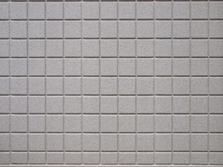 白い正方形の壁面