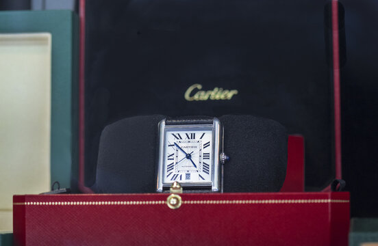 Closeup Cartier wristwatch red box. Milan - Italy, June 25 2022