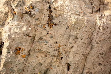 Background Stone wall, background with abstract stains of epoxy resin. Beautiful texture of marble and granite with stains, onyx surface. Finishing stone for furniture and interior. Acrylic stains