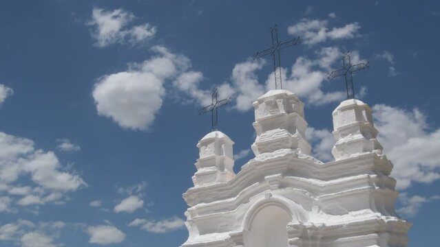 Vicar altar with clouds moving, religious monument in Monda, Malaga, Spain