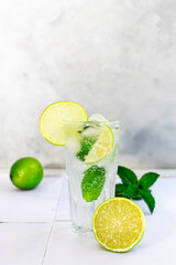 Mojito summer refreshing cocktail with ice, lime and mint