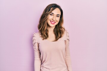 Fototapeta premium Young hispanic girl wearing casual clothes with a happy and cool smile on face. lucky person.