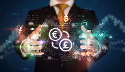 Businessman holding currency symbols concept