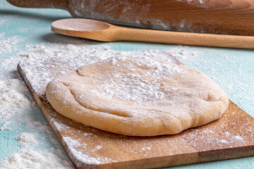 Preparing dough for bakery. Ravioli dough and flour