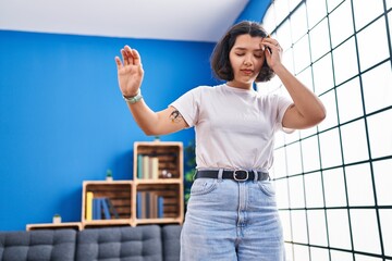 Young woman suffering for dizzy at home