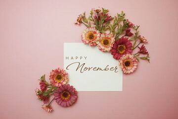 Happy November day typography text with flowers on pink background © may1985