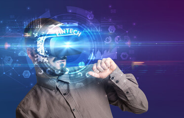 Businessman looking through VR glasses