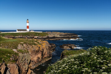Fototapeta na wymiar view of the historic Buchan Ness Lighthouse in northern Scotland