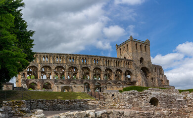 Fototapeta premium view of the Augustinian Jedburgh Abbey ruins and cemetery in southern Scotland