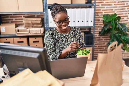 African American Woman Ecommerce Business Worker Eating Salad At Office