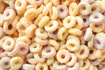 close up of colorful cereal corn flakes in a bowl 