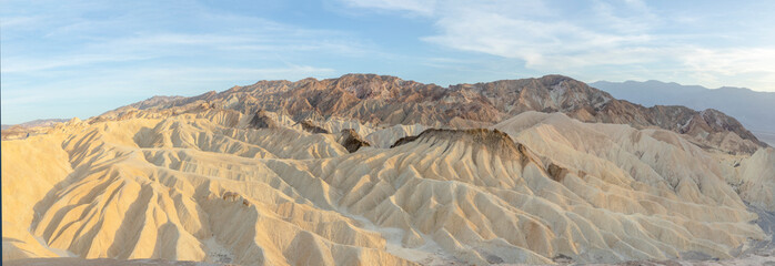 scenic view of Zabrskie point in the death valley in sunset mood