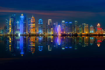 Fototapeta premium Panoramic skyline of Doha city at night, Qatar.