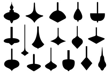 Collection of different spinning tops isolated on white