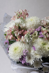 Beautiful spring bouquet. Arrangement with various flowers. The concept of a flower shop. A set of photos for a site or catalogue. Work florist.