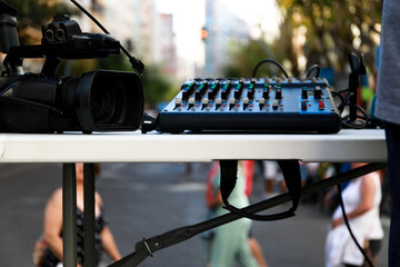  A mixing console and a video camera to broadcast the event of the parade of the Alicante Fires...