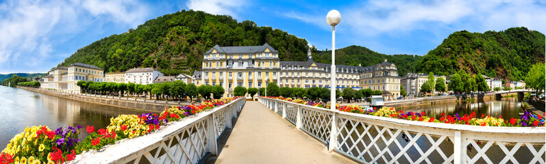 Panorama view from the bridge with blooming flowers to the promenade of Bad Ems at River Lahn in...