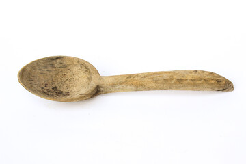 Wooden spoon with a carved pattern on the handle