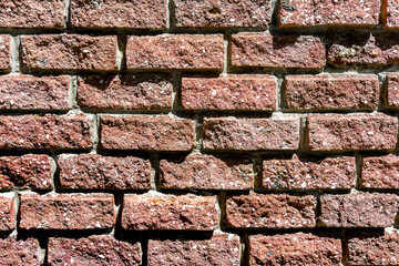 An old weathered brick wall. Pattern and texture of brickwork