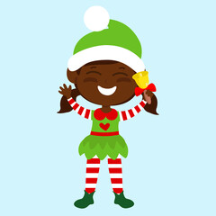 The elf holding a bell in his hand stands straight and stands straight and . The child is happy and smiling and she is delighted. The child is wearing traditional elf clothing and striped tights. 