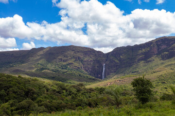 Fototapeta premium Casca d'Anta waterfall in the background in Serra da Canastra in Minas Gerais
