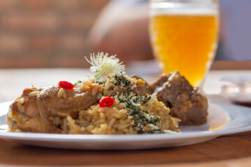 typical food with chicken and edible flowers in Serra da Canastra in Minas Gerais