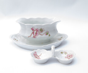 Vintage porcelain sauce bowl and spice holder