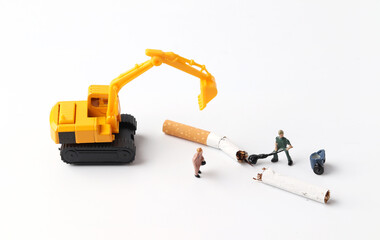 Miniature people break cigarettes, Smoking cessation concept.