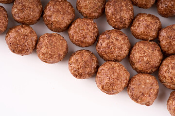 Variety of cold cereals, quick breakfast for kids overhead shot. Quick breakfast. Chocolate balls isolated on a white background. Rings isolated on a white background. 