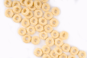 Variety of cold cereals, quick breakfast for kids overhead shot. Quick breakfast. Chocolate balls isolated on a white background. Rings isolated on a white background. 
