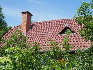 Smoke stack on the roof of a house