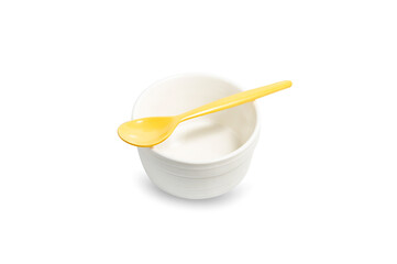 white cup and yellow spoon  on white background