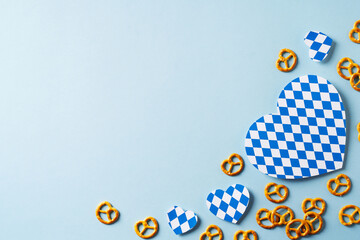 Oktoberfest backdrop with blue traditional print hearts on blue background