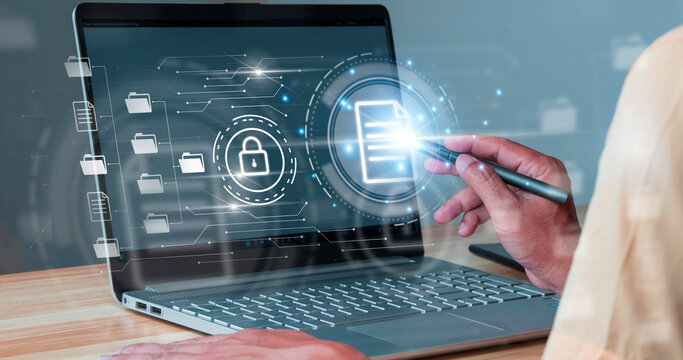 Businessman working modern compter Document Management System (DMS),Virtual online documentation database and process automation to efficiently manage files,