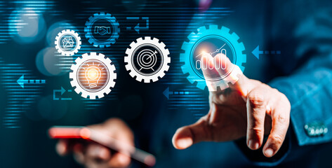 Businessman's hand and Virtual Screen icons display digital marketing, financial, banking and big data