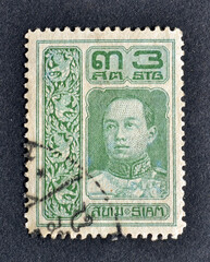 Cancelled postage stamp printed by Thailand, that shows portrait of King Vajiravudh, circa 1912.